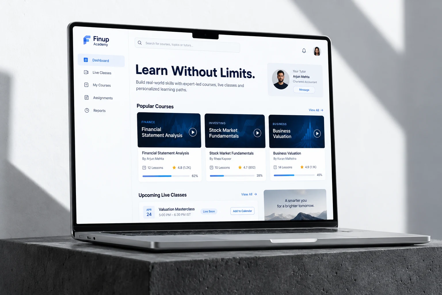 Finup Academy website displayed on a laptop
